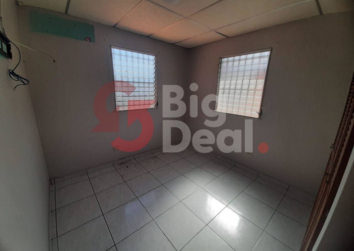 Covered carport with tiled floor ceiling fans wash basin Condado del Rey Panama