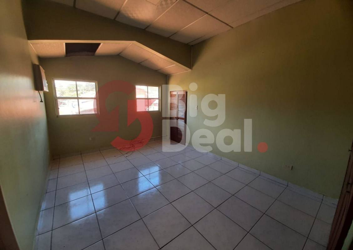 Small empty room with tiles and windows in Condado del Rey Panama City