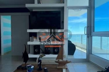 Bedroom featuring floor to ceiling windows with sea view in PH Coronado Bay Panama