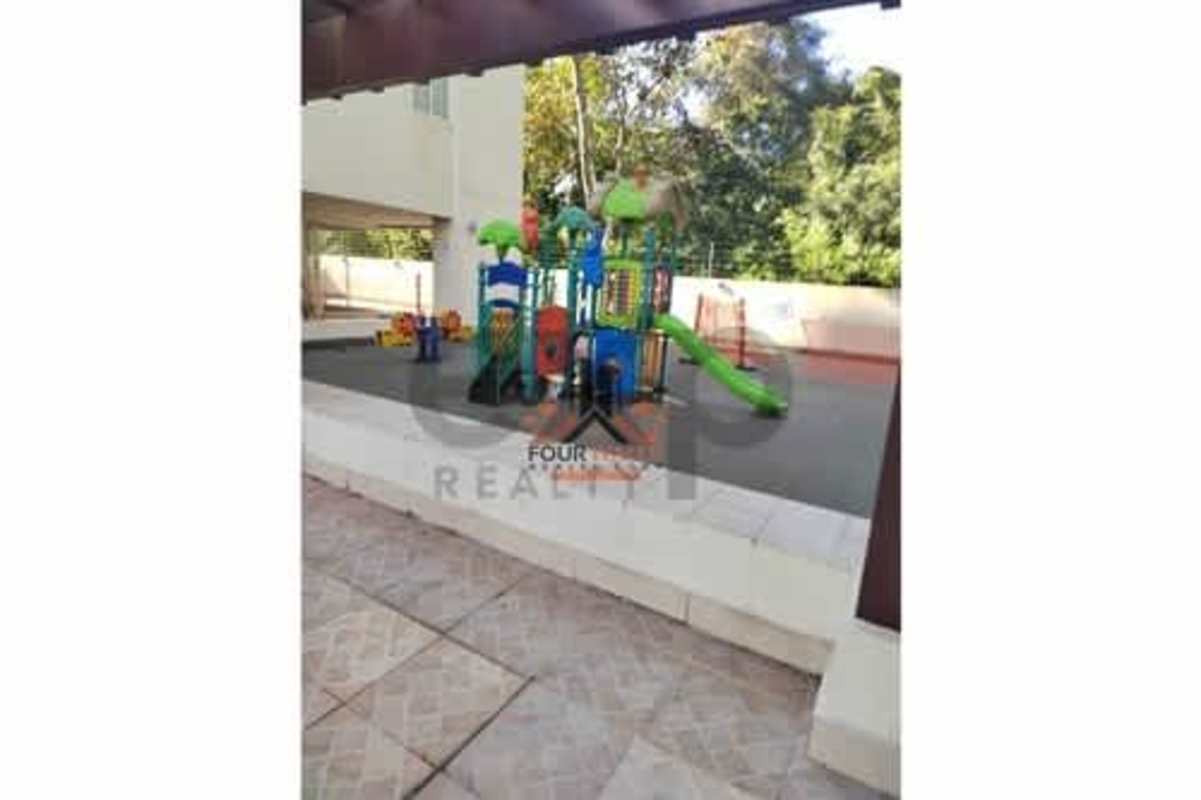 Children playground with colorful equipment at PH Met View Betania Panama