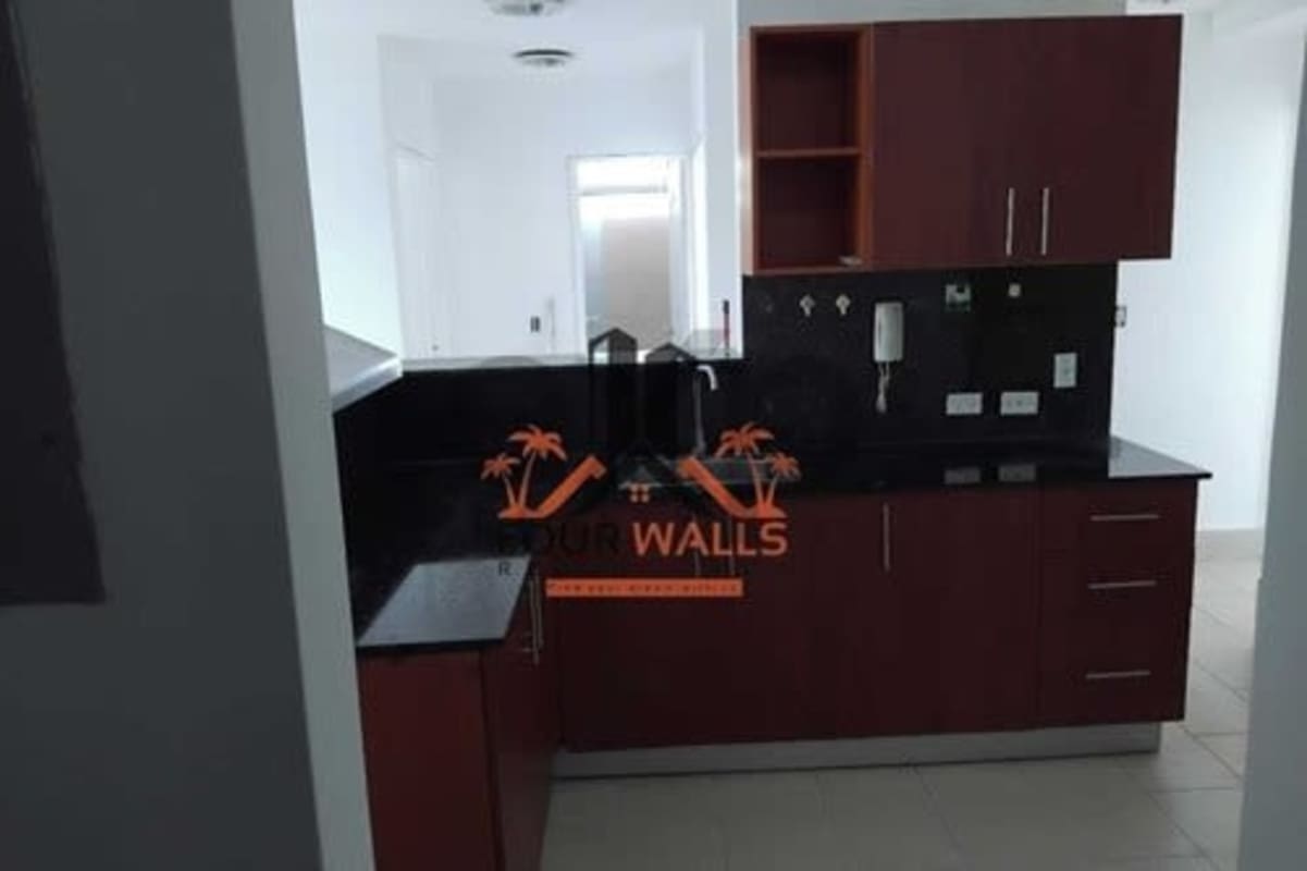 Kitchen with granite countertops wooden cabinetry window PH Met View Betania Panama