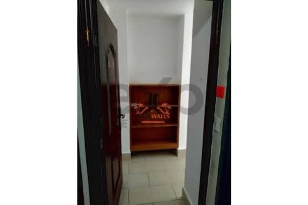 Narrow hallway leading into kitchenette area PH Met View Betania Panama