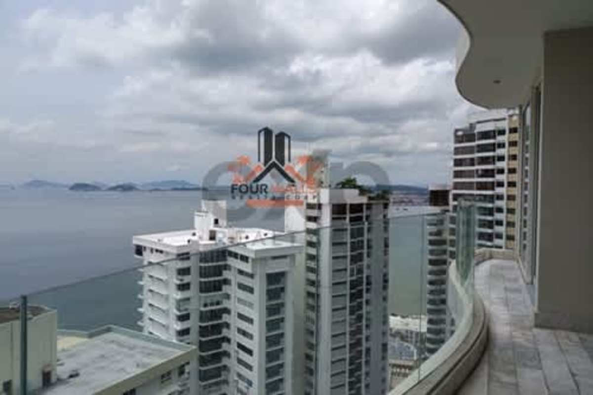 Large modern living area with marble floors and sea view windows at PH The Towers Punta Paitilla Panama City
