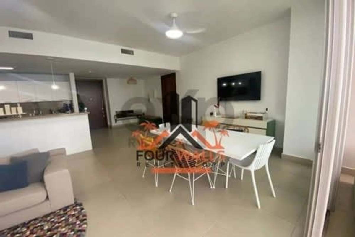 Oceanfront balcony with wicker seating overlooking Pacific PH Dupont Tower