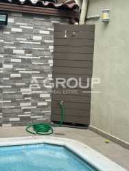 Pool with outdoor shower and patio in River Valley Panama house for sale