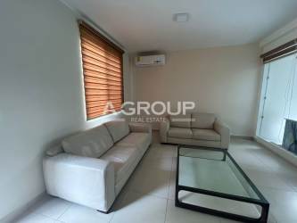 Modern living room with sofas and AC in River Valley Panama Pacifico house for sale