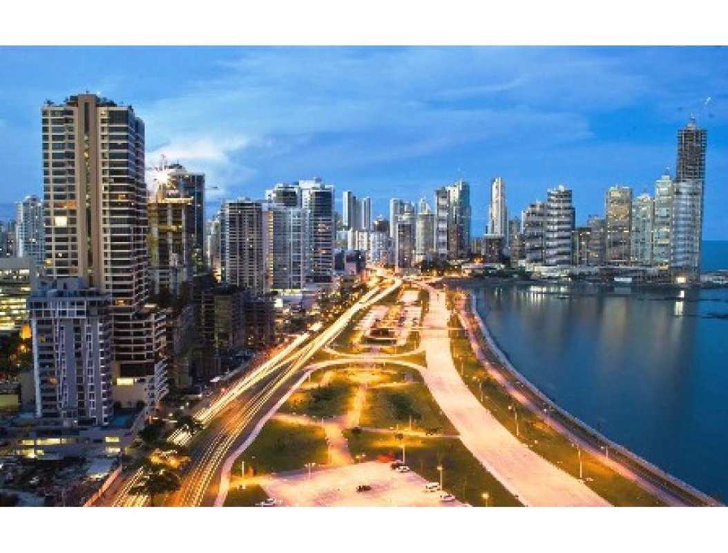 City skyline with waterfront skyscrapers along Avenida Balboa Panama City