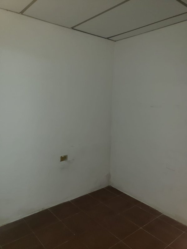 Empty small room with tile flooring, drop ceiling in rental Hato Pintado Panama