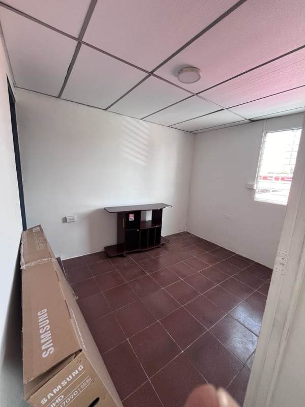 Simple partition storage or utility space with shelving affordable rental Panama City