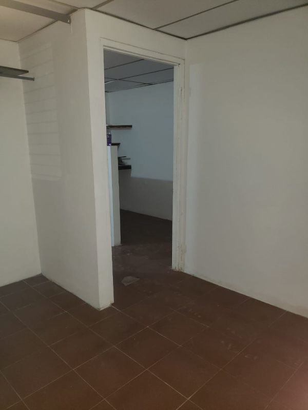 Hallway connecting to utility storage space budget-friendly rental Panama Hato Pintado