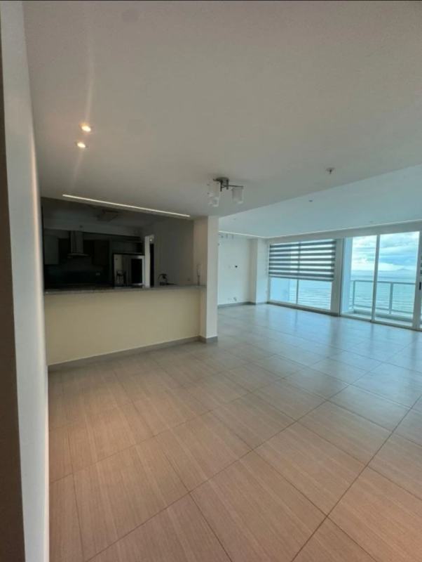 Open living dining kitchen with balcony ocean view PH Asia Costa del Este