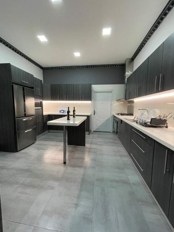 Bedroom with gray tones, air conditioning and minimalist design in rental home Altos del Panamá