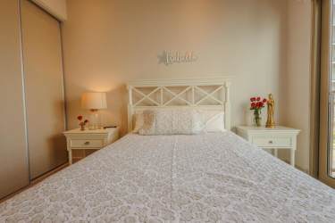 Spacious master bedroom canopy bed balcony ocean view Playa Escondida luxury villa Panama
