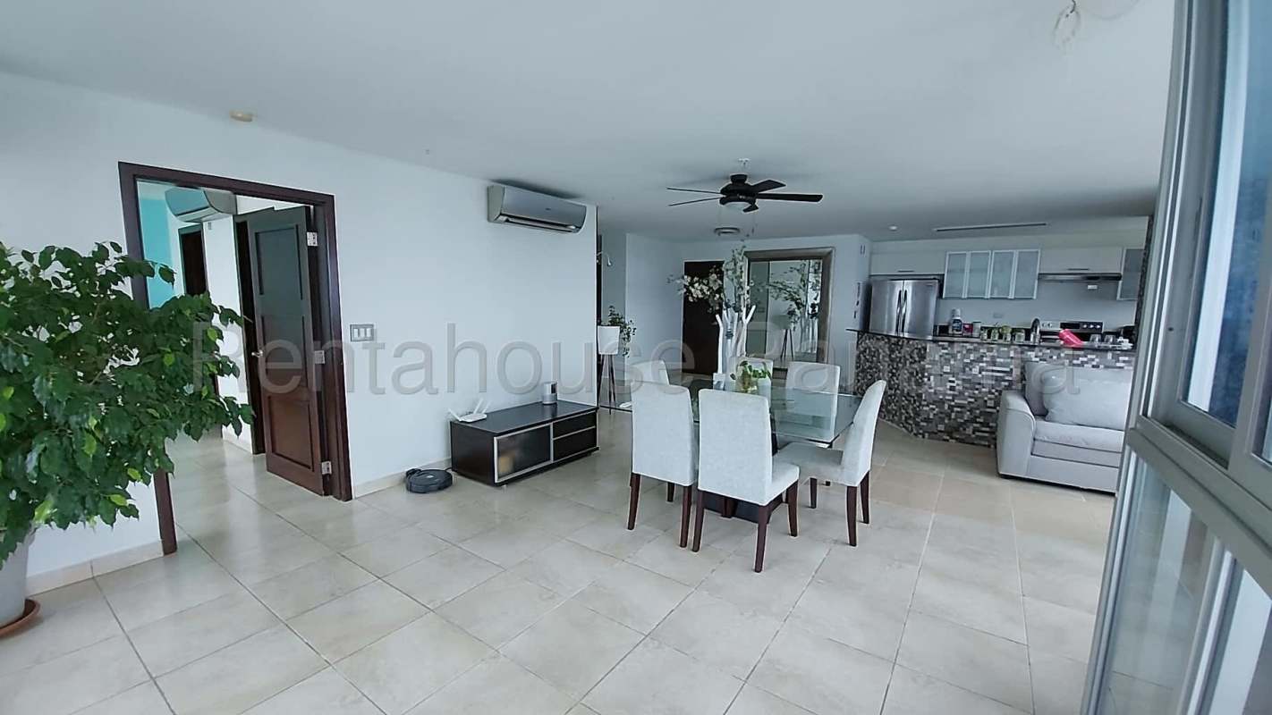 Spacious living room ocean views large windows sofa PH Riverside Costa del Este Panama