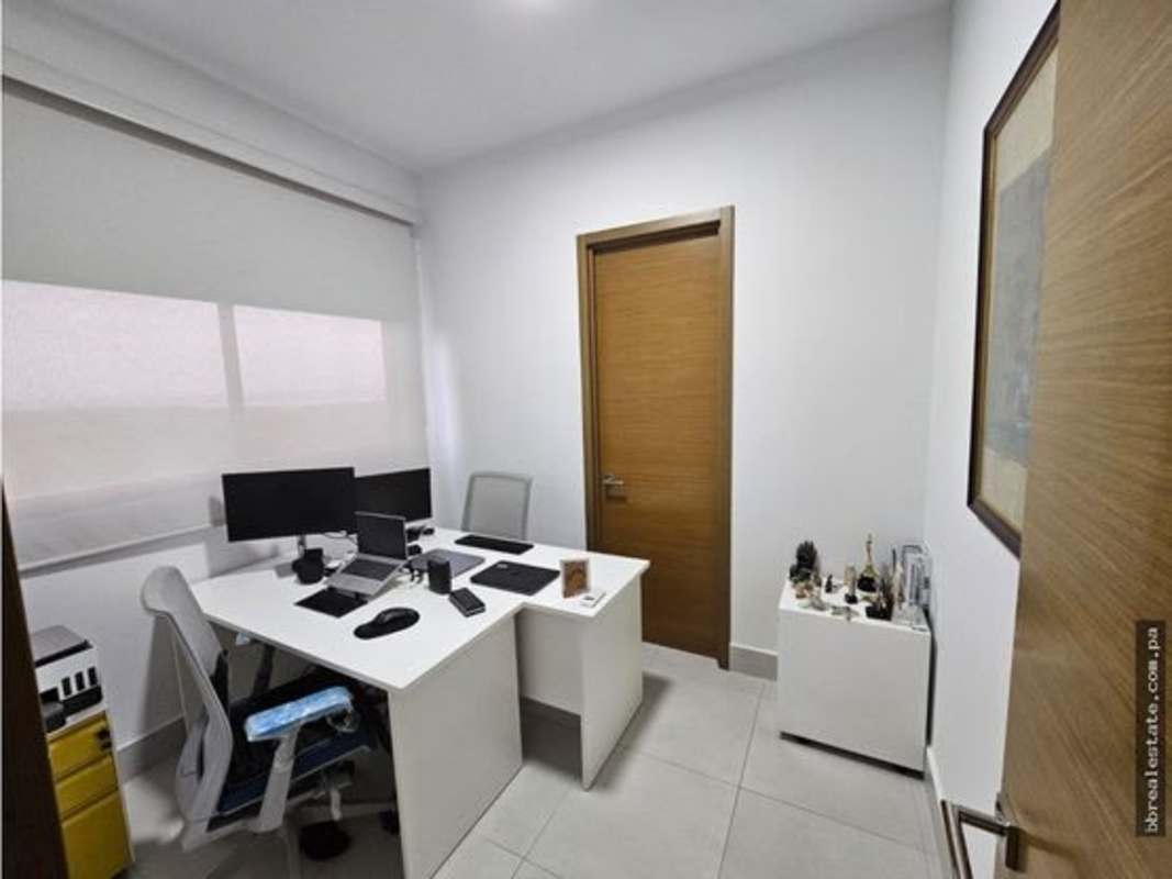 Spacious balcony with ceiling fans, glass railings, city and golf views PH Empire Santa Maria