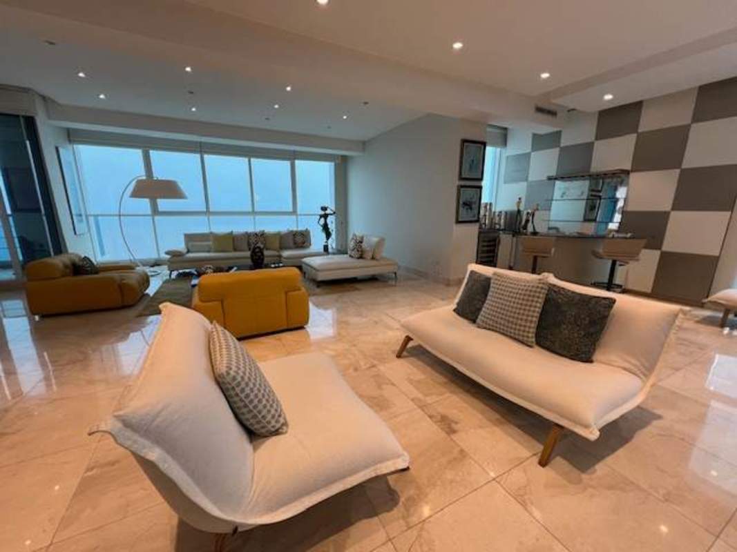 Formal dining space with ocean view marble floors luxury apartment PH Vitri Costa del Este