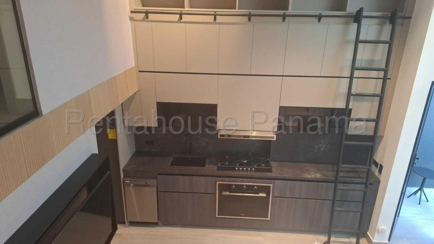 Bright mezzanine bedroom in loft with ocean skyline views at PH Dovle Coco del Mar Panama City