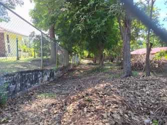 Outdoor land parcel with fence, natural shade, near beach Coronado Panama