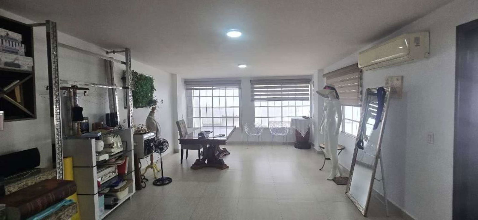 Master bedroom with ornate cream furniture in Costa del Este house for sale