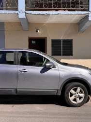 Parking area and front entrance of commercial units in Boquete plaza Panama