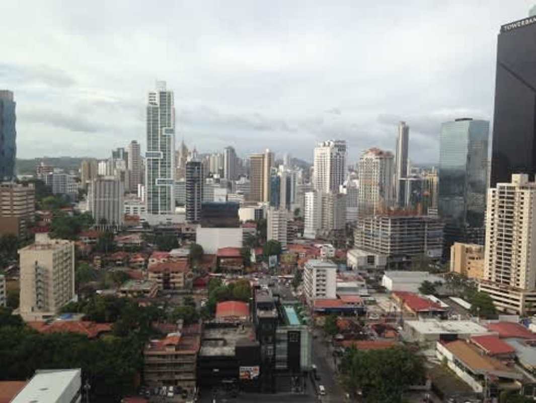 Modern kitchen with granite countertops and stainless steel appliances in PH Vista del Mar Panama City