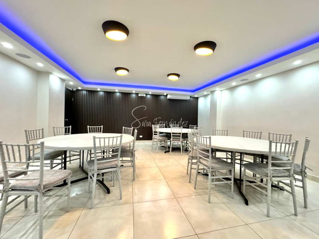 Bright living room with marble floors, enclosed oceanfront balcony sunroom in Punta Paitilla Panama