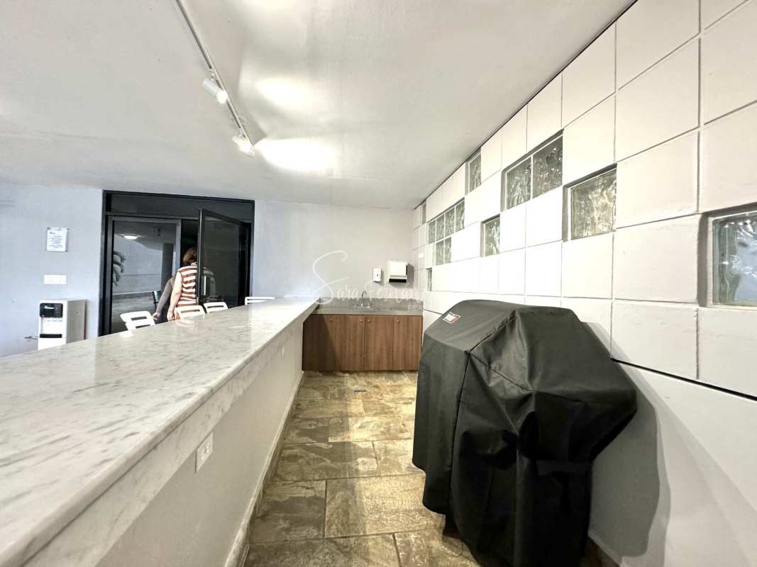 Luxury dining room with marble floors and stained glass window PH Paitilla Bay Tower Panama