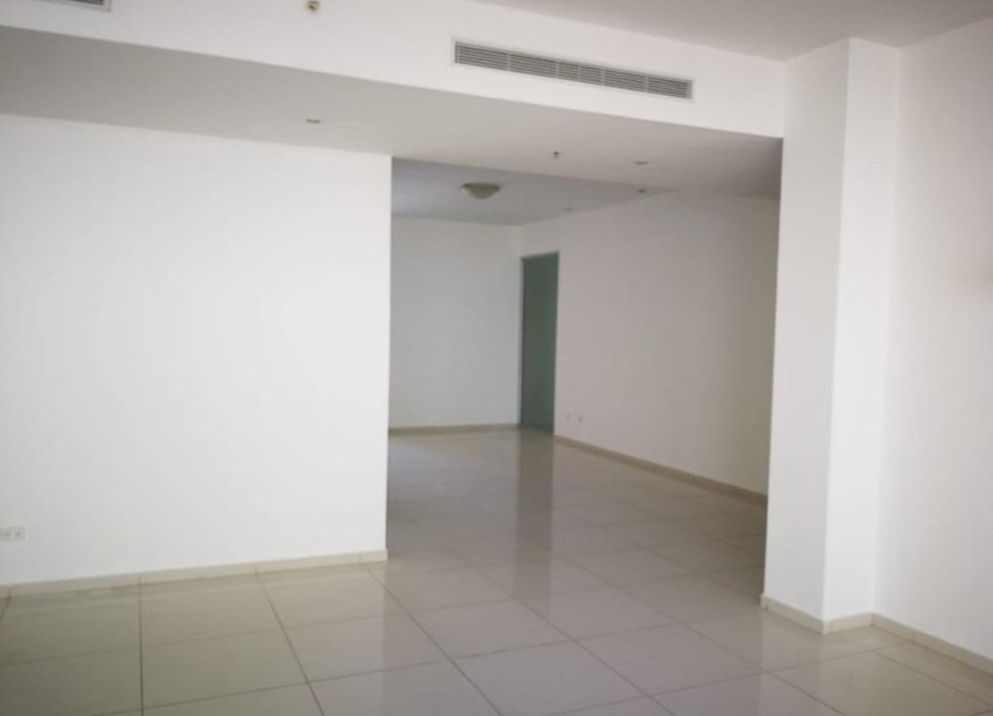 Minimalist bright interior space with tile floor and ceiling lights PH Altamar Costa del Este apartment Panama