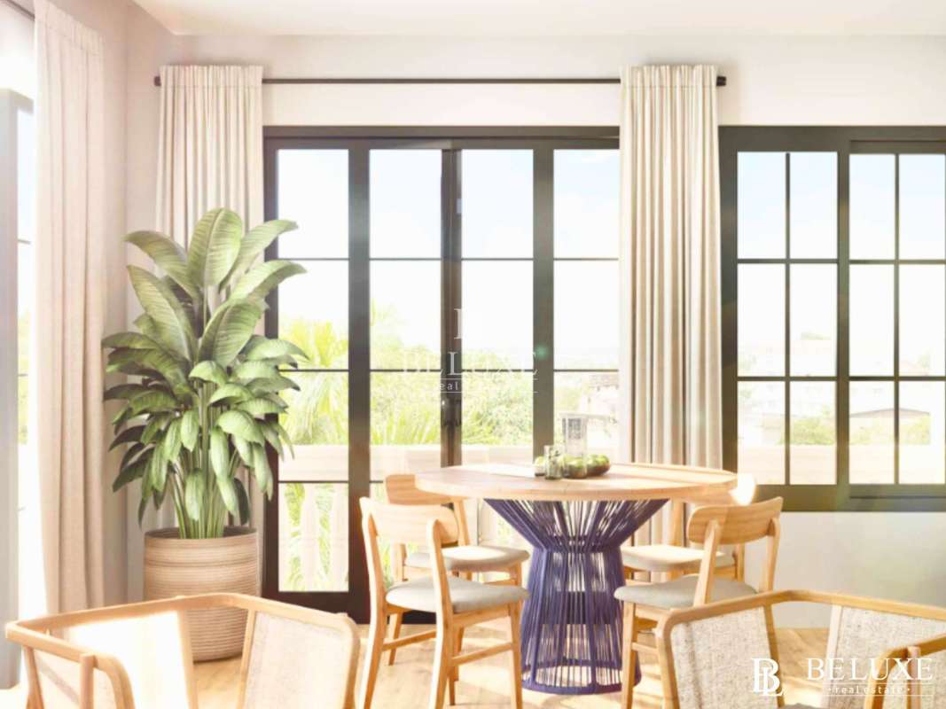 Lobby area with exposed brick, elevator door and pendant lighting PH Plaza Novena