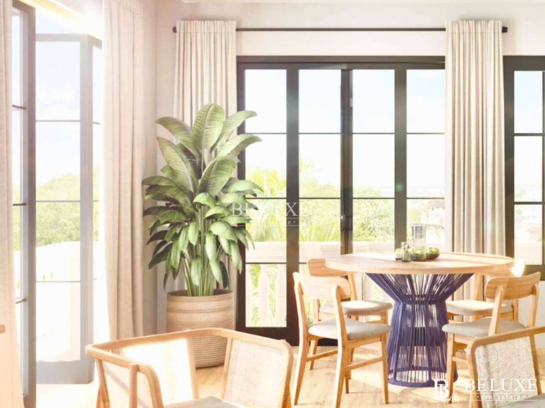 Bright contemporary dining space with floor-to-ceiling windows and balcony PH Plaza Novena