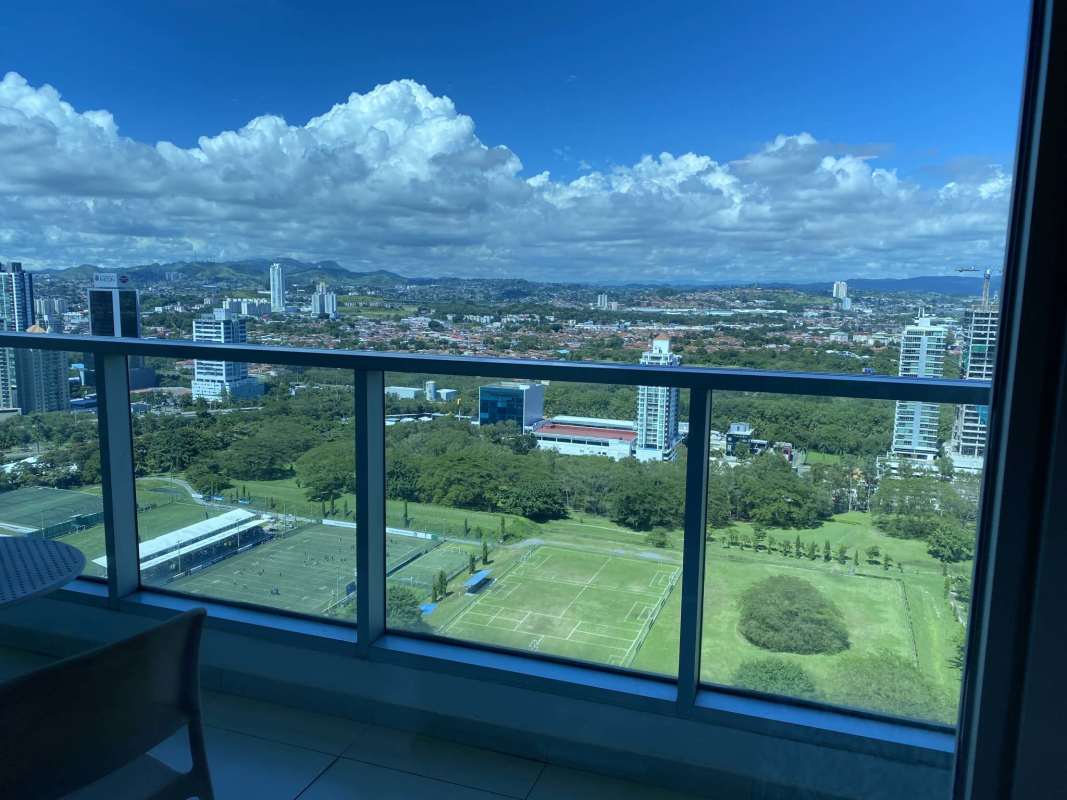 Large balcony with panoramic views of ocean, city, and park at PH Parkside Costa del Este Panama