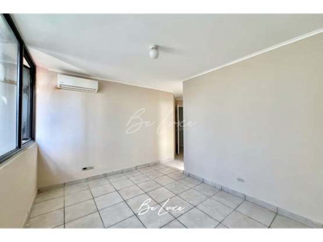 Spacious rooftop terrace featuring BBQ area and panoramic ocean city views in Coco del Mar Panama