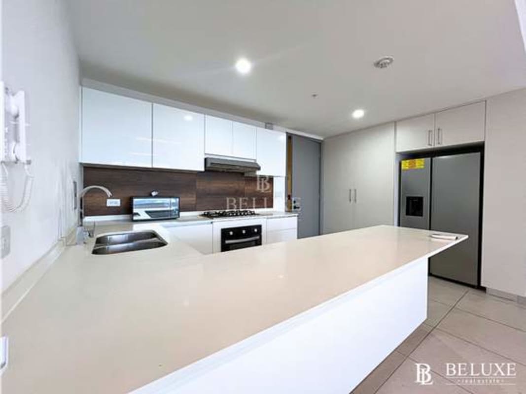 Open concept kitchen with contemporary design at PH Van Gogh El Cangrejo Panama City apartment rental