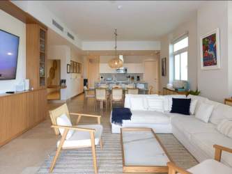 Bright modern living dining layout with neutral coastal style Marina Village Buenaventura Panama