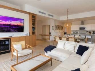 Modern open concept living dining kitchen space Buenaventura Marina Village luxury condominium