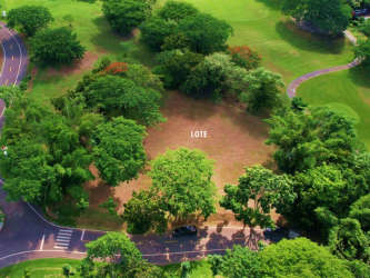 Aerial of vacant 2476m2 lot lush landscaping inside golf and beach resort Buenaventura Panama