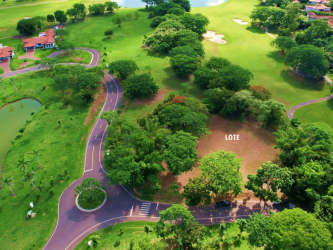 Aerial shot of large lot outlined with nearby pond and golf views in Buenaventura Beach Resort Panama