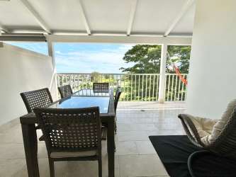 Modern kitchen with cabinetry and appliances space in luxury condo marina village good natural light Panama