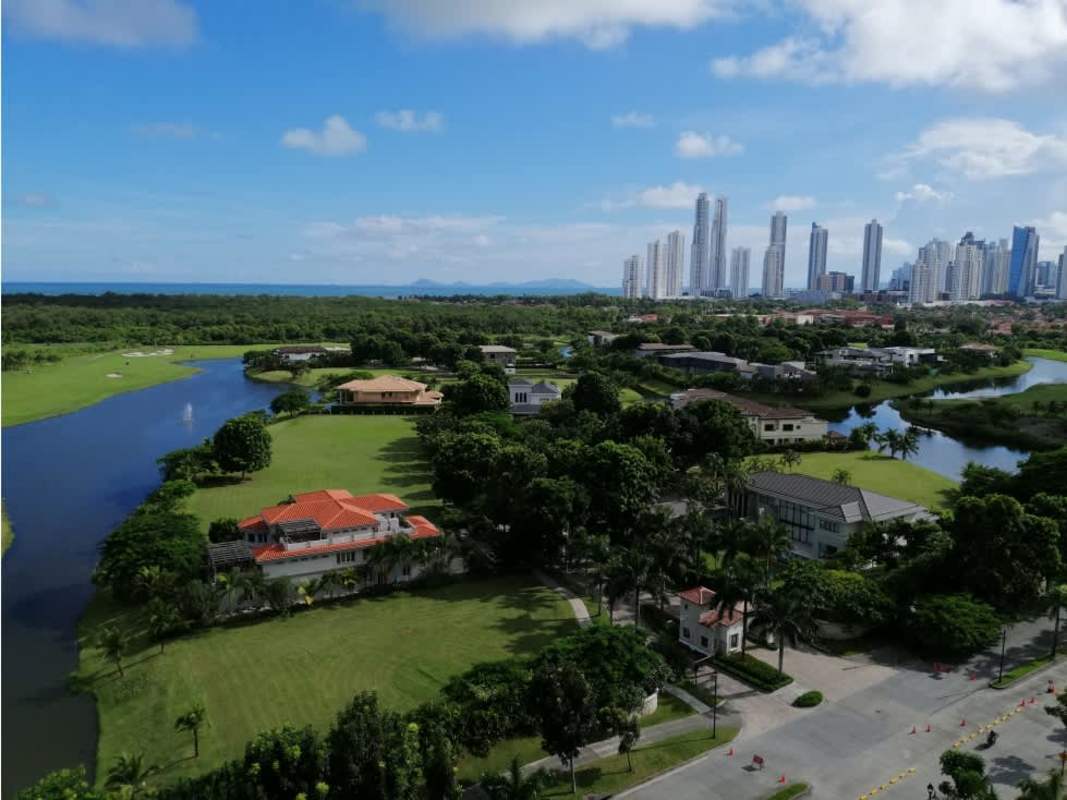 Luxury golf community aerial with Valery Point tower and green spaces Santa María Panama