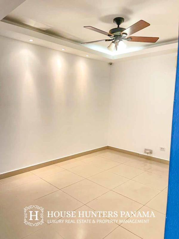 Bedroom with tray ceiling, recessed ceiling lights, ceramic tiled floor in The View Tower Panama City