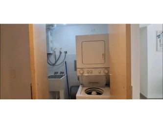 Modern bathroom with glass shower enclosure, vanity in PH Mosaic Panama