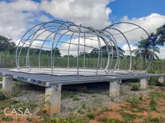 Partial geodesic dome metal frame on rural land near Boquete