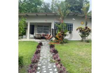 Rustic ranch with thatched roof, hammocks and tiled floor for social gatherings at El Valle Panama estate