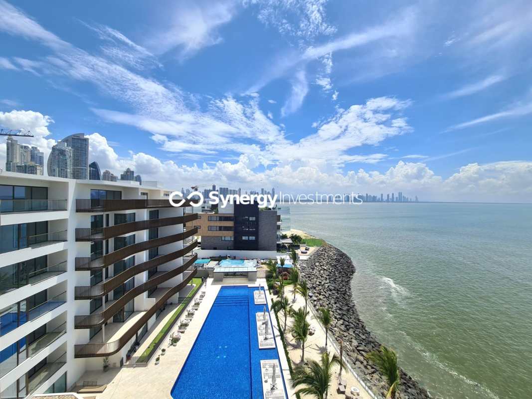 Bedroom with large windows city/ocean view luxury amenities Ocean Reef Islands penthouse Panama