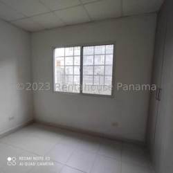 Covered laundry terrace area with backyard view in rental home Montelimar Costa Verde Panama