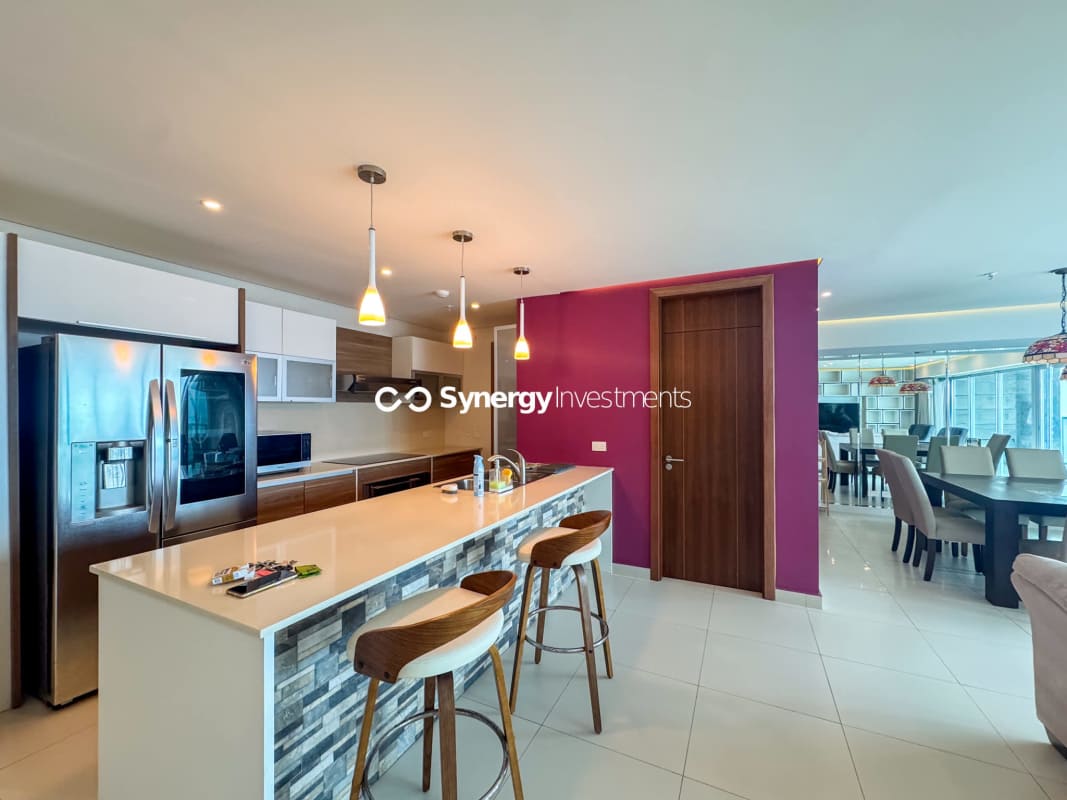 Spacious living area with ocean view windows in PH Parkside Costa del Este Panama