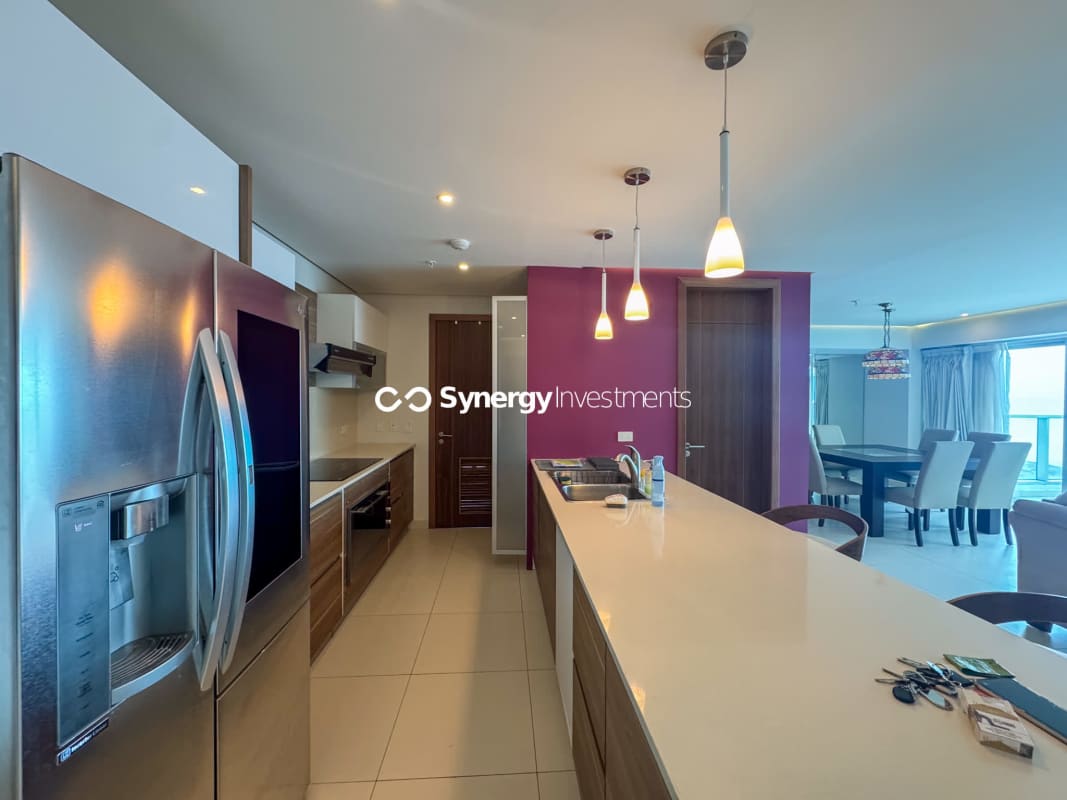 Contemporary kitchen with granite island and built-in appliances PH Parkside Costa del Este Panama