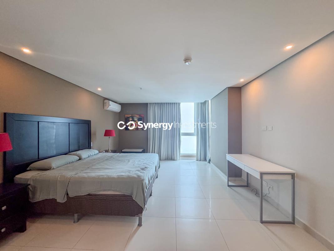 Rooftop pool with panoramic city and ocean views at PH Parkside Costa del Este Panama