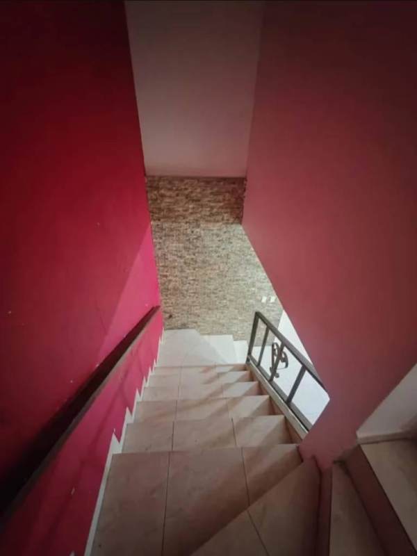 Rustic style bar with brick wall and wooden ceiling in Cerro Viento duplex Panama