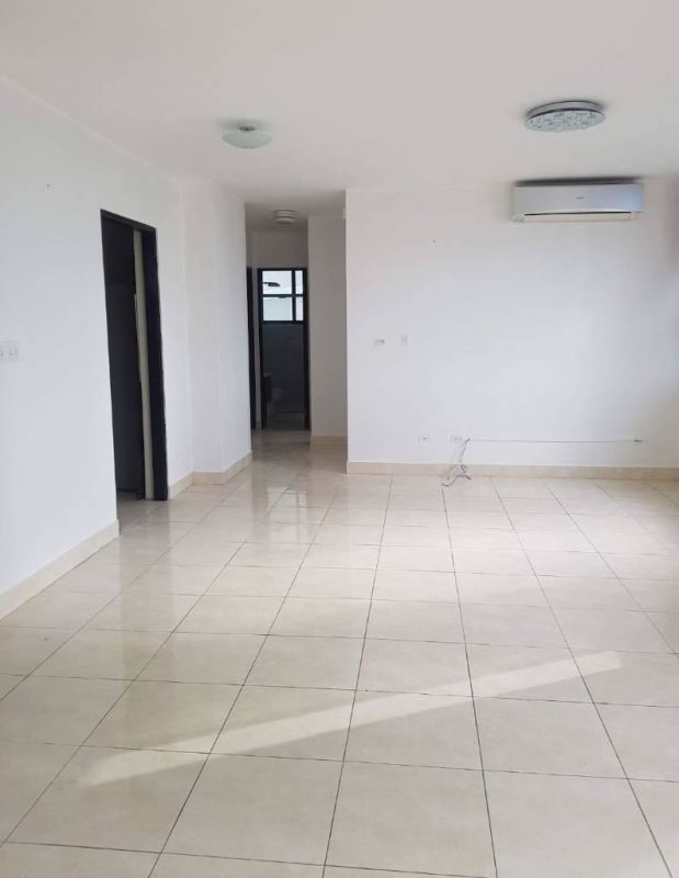 Living room with split air conditioner and tiled floor at PH Elite Pacific Hills Dos Mares Panama City